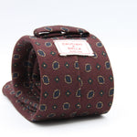 Cruciani &amp; Bella
Printed and Handmade in Italy
100% Wool
Unlined
Rust, Beige and Blue Motif Tie
8 cm x 150 cm
#9745