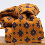 Cruciani &amp; Bella
Printed and Handmade in Italy
100% Wool
Unlined
Golden Yellow, Beige, Red Wine and Blue Motif Tie
8 cm x 150 cm
#9749