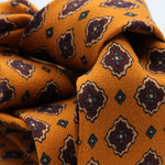 Cruciani &amp; Bella
Printed and Handmade in Italy
100% Wool
Unlined
Golden Yellow, Beige, Red Wine and Blue Motif Tie
8 cm x 150 cm
#9749