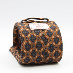 Cruciani &amp; Bella
Printed and Handmade in Italy
100% Wool
Unlined
Beige, Blue, Grey and Brown Motif Tie
8 cm x 150 cm
#9759