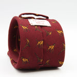 Cruciani &amp; Bella
Printed and Handmade in Italy
100% Wool

Unlined

Red Tie with Light Brown Dogs and Pheasants pattern

#9765