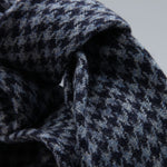 Cruciani &amp; Bella
100% Shetland Wool
Navy Blue and Light Blue Houndstooth
Unlined Tie
Handmade in Italy
#9795
Suggested knot: Four-in-hand
