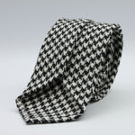 Cruciani &amp; Bella
100% Shetland Wool
White and Black Houndstooth
Unlined Tie
Handmade in Italy
#9798
Suggested knot: Four-in-hand