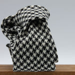 Cruciani &amp; Bella
100% Shetland Wool
White and Black Houndstooth
Unlined Tie
Handmade in Italy
#9798
Suggested knot: Four-in-hand