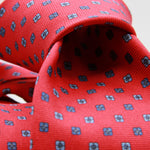 Cruciani &amp; Bella
100% Printed Silk

Self-Tipped
Red, Blue and Light Blue motif Tie&nbsp;
Handmade in Rome, Italy.

8 cm x 150 cm
#9830