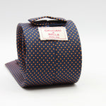 Cruciani &amp; Bella
100% Printed Silk

Self-Tipped
Navy Blue and Orange Pindots Tie&nbsp;
Handmade in Rome, Italy.

8 cm x 150 cm
#9843