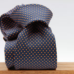 Cruciani &amp; Bella
100% Printed Silk

Self-Tipped
Navy Blue and Orange Pindots Tie&nbsp;
Handmade in Rome, Italy.

8 cm x 150 cm
#9843