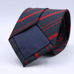Holliday &amp; Brown for Cruciani &amp; Bella
100% Jacquard Silk
Tipped
"Royal Corps of Military Police" Regimental Tie
Navy Blue and Red Stripes
Handmade in Italy
8 cm x 148 cm
#9847