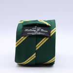 Holliday &amp; Brown for Cruciani &amp; Bella
100% Jacquard Silk
Tipped
Regimental Tie
Green and Yellow Stripes
Handmade in Italy
8 cm x 148 cm
#9851