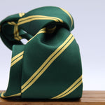 Holliday &amp; Brown for Cruciani &amp; Bella
100% Jacquard Silk
Tipped
Regimental Tie
Green and Yellow Stripes
Handmade in Italy
8 cm x 148 cm
#9851