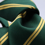 Holliday &amp; Brown for Cruciani &amp; Bella
100% Jacquard Silk
Tipped
Regimental Tie
Green and Yellow Stripes
Handmade in Italy
8 cm x 148 cm
#9851