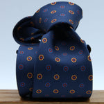 Cruciani &amp; Bella
100% Silk
Self-Tipped
Navy Blue, Yellow and Red Motif Tie
Handmade and Printed in &nbsp;Italy
English Archive Motif
8 cm x 150 cm
#9950