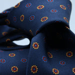 Cruciani &amp; Bella
100% Silk
Self-Tipped
Navy Blue, Yellow and Red Motif Tie
Handmade and Printed in &nbsp;Italy
English Archive Motif
8 cm x 150 cm
#9950