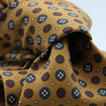 Cruciani &amp; Bella

100% Printed Madder Silk&nbsp;
Italian fabric

Unlined tie
Mustard, Blue, Rust and Light Beige Printed Motif Tie

Handmade in Italy
8 cm x 150 cm
#9988