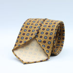 Cruciani &amp; Bella

100% Printed Madder Silk&nbsp;
Italian fabric

Unlined tie
Mustard, Blue, Rust and Light Beige Printed Motif Tie

Handmade in Italy
8 cm x 150 cm
#9988