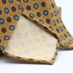 Cruciani &amp; Bella

100% Printed Madder Silk&nbsp;
Italian fabric

Unlined tie
Mustard, Blue, Rust and Light Beige Printed Motif Tie

Handmade in Italy
8 cm x 150 cm
#9988