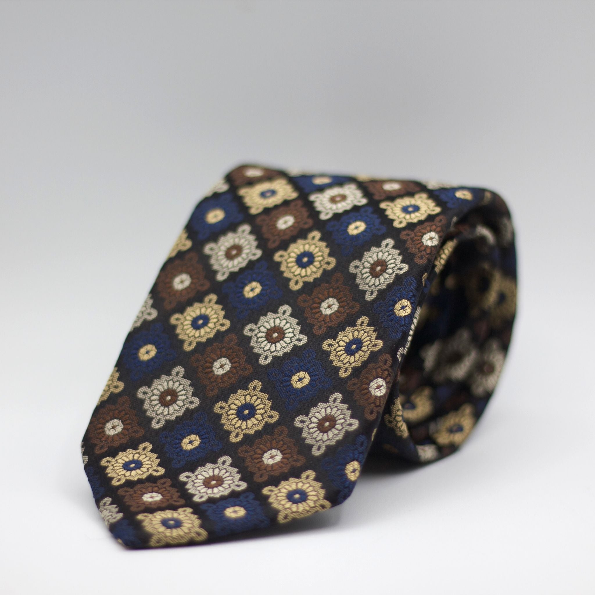 Franco Bassi for Cruciani & Bella 100% Silk Jacquard  Tipped Black, Brown, Blue, Gold and Grey Medallions tie Handmade in Italy 8 cm x 150 cm