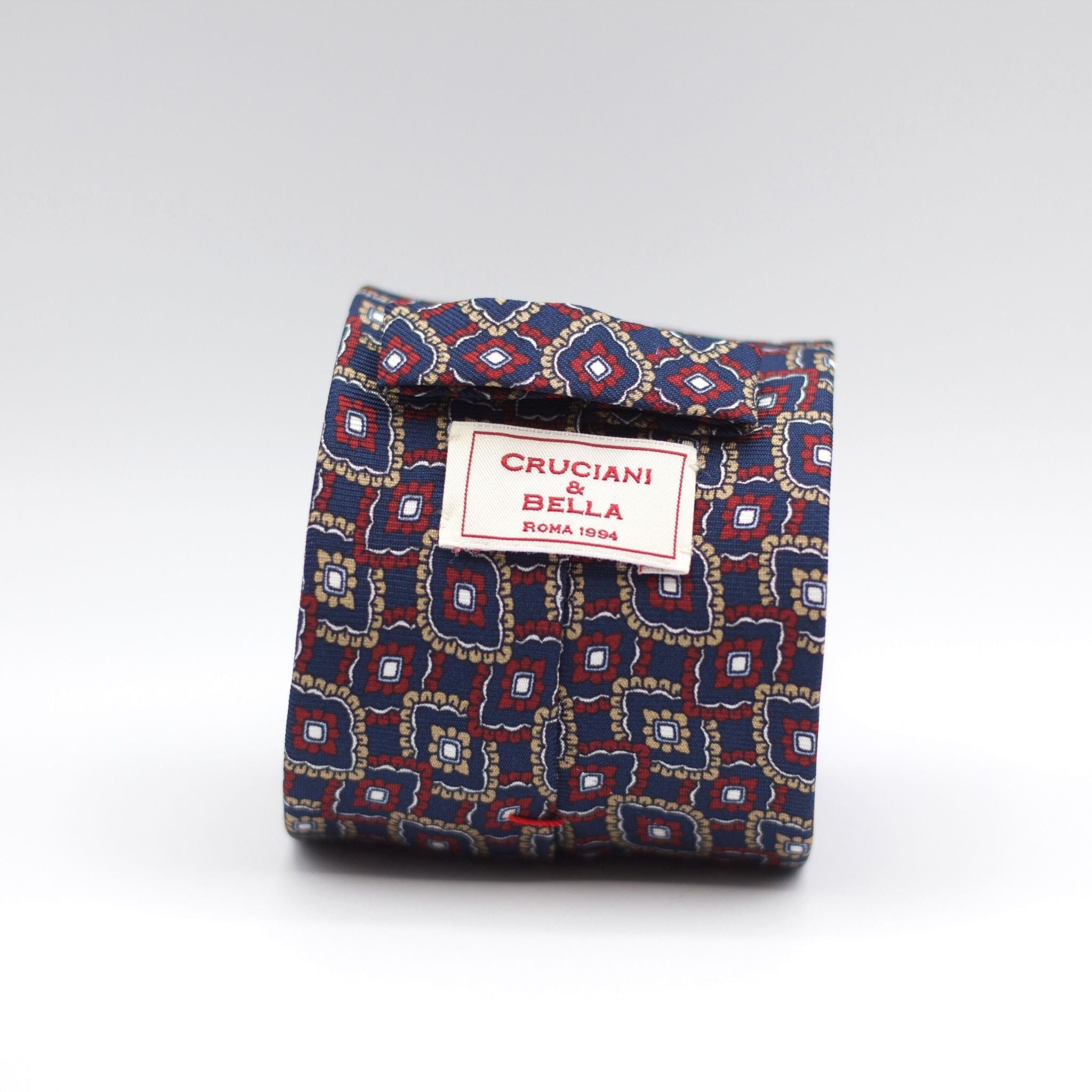 Cruciani & Bella 100% Silk Printed Self-Tipped Blue, Beige, Red and White Motif Tie Handmade in Rome, Italy. 8 cm x 150 cm