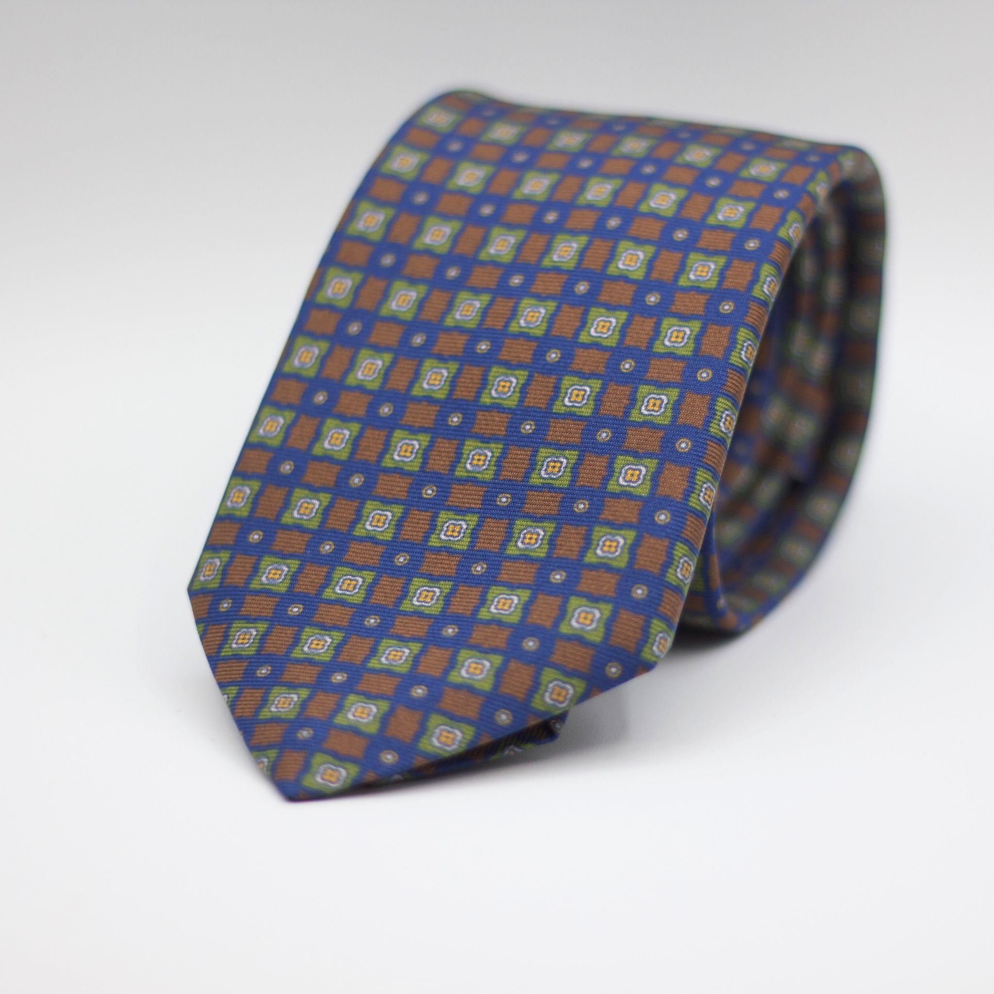 Cruciani & Bella 100% Silk Printed Self-Tipped Blue, Brown, Green, White and Yellow  Motif Tie Handmade in Rome, Italy. 8 cm x 150 cm