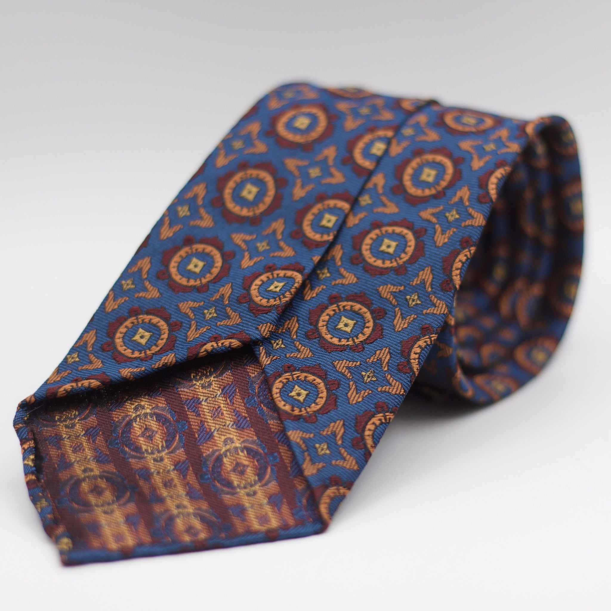 Cruciani & Bella 100% Woven Jacquard Silk Unlined Blue, Burgundy and Gold Motif Unlined Tie Handmade in England 8 x 153 cm