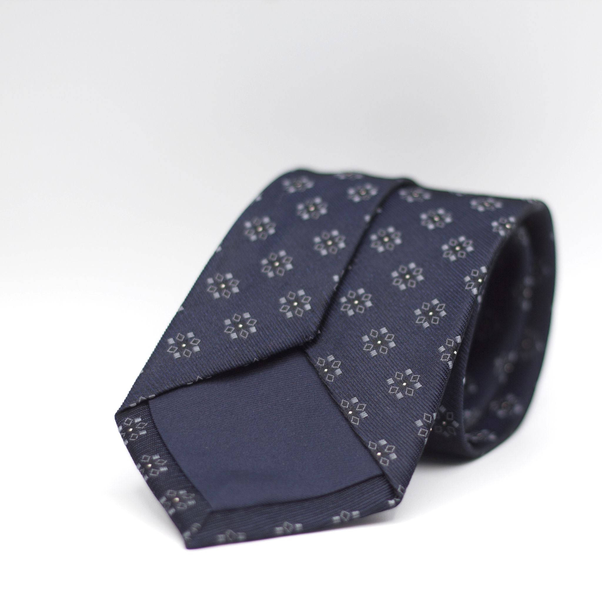 Holliday & Brown for Cruciani & Bella 100% Woven Jacquard Silk Tipped Blue, Grey, Black  and White  motif tie Handmade in Italy 8 cm x 150 cm