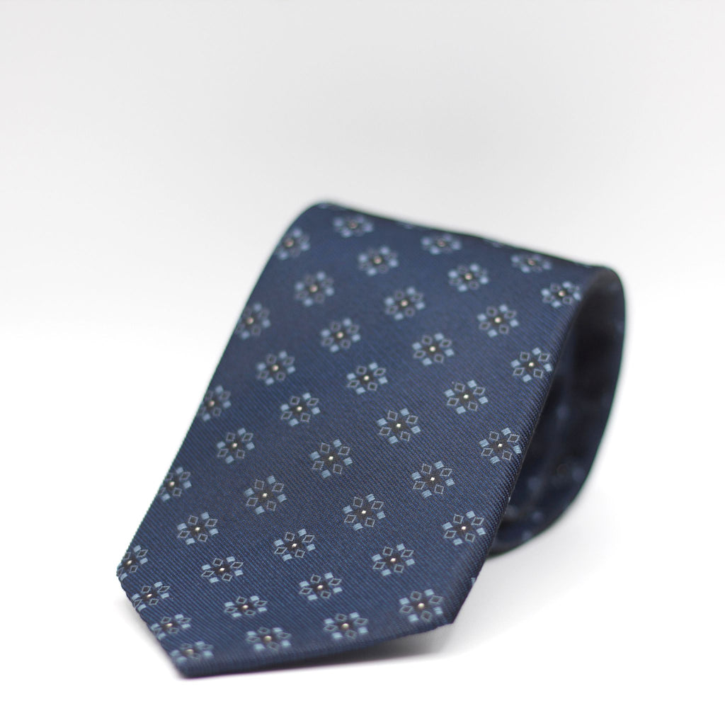 Holliday & Brown for Cruciani & Bella 100% Woven Jacquard Silk Tipped Blue, Light Blue, Black  and White  motif tie  Handmade in Italy 8 cm x 150 cm