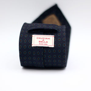 Cruciani & Bella 100%  Printed Wool  Unlined Hand rolled blades Blue, Light Blue and Burgundy Motifs Tie Handmade in Italy 8 cm x 150 cm