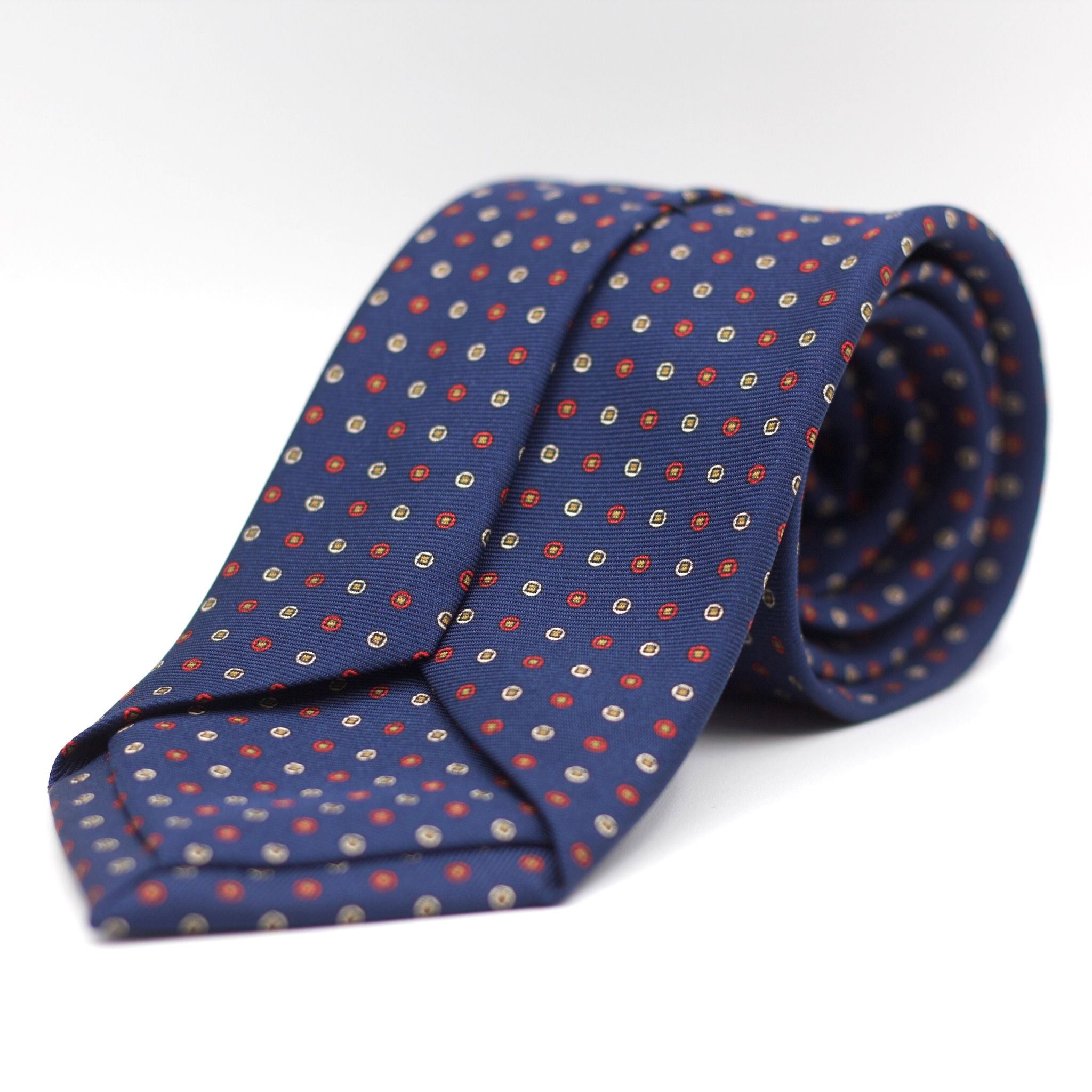 Blue, with Red, Yellow and White motif tie&nbsp;