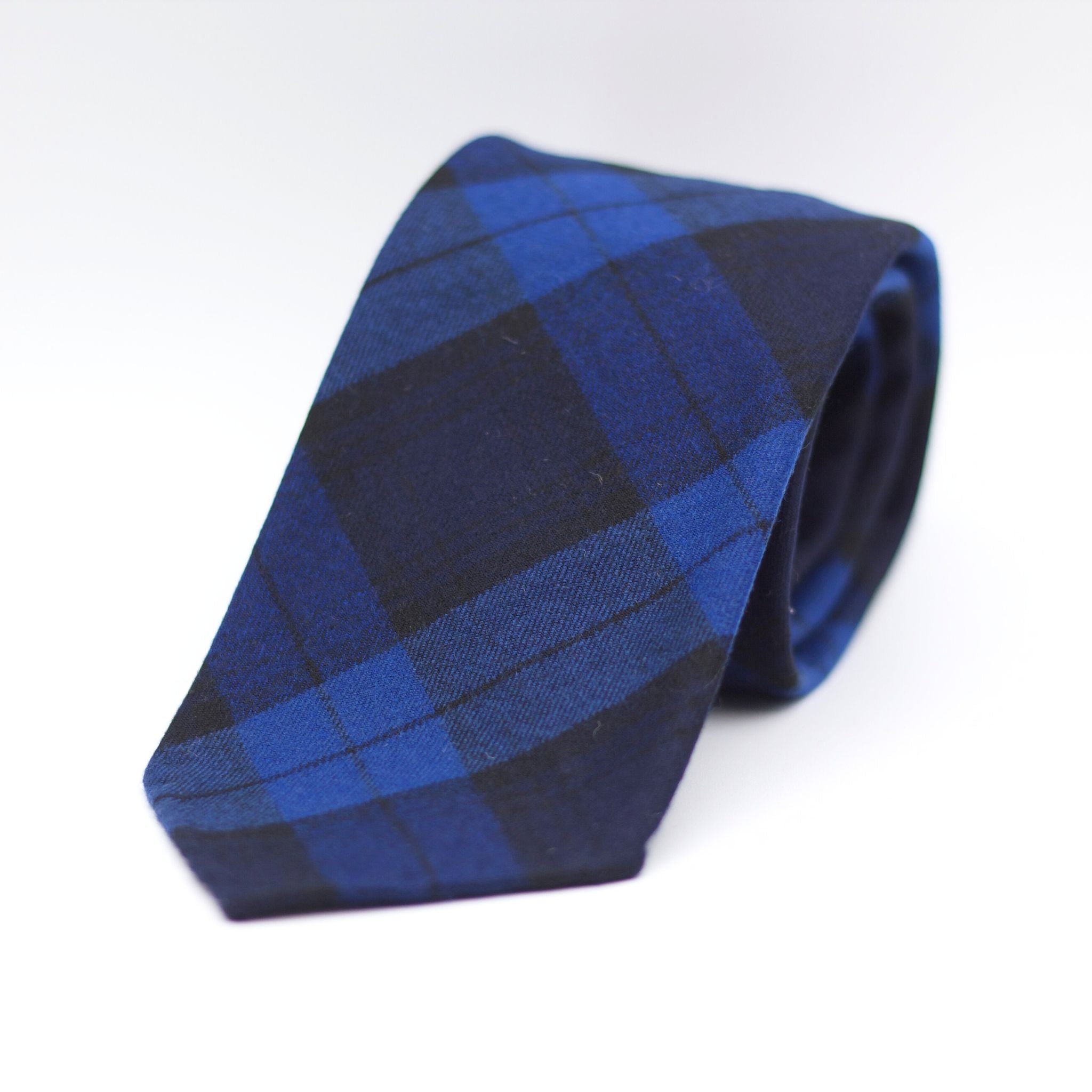 Cruciani & Bella  100% Wool Flannel  Unlined  Hand rolled blades  Blue and Light Blue Tartan Tie  Handmade in Italy  8 cm x 150 cm