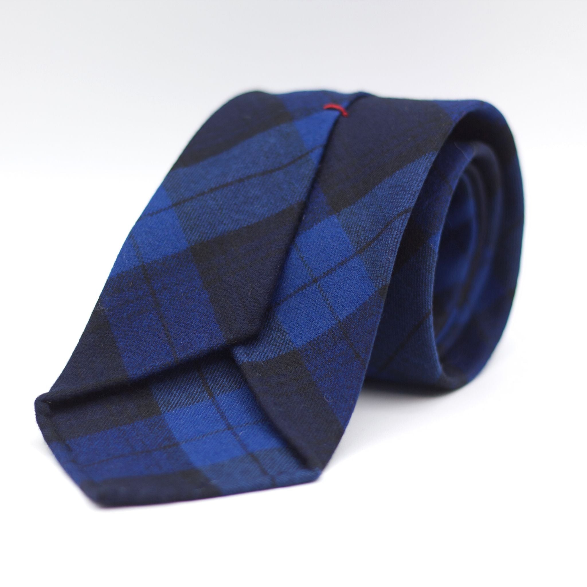 Cruciani & Bella  100% Wool Flannel  Unlined  Hand rolled blades  Blue and Light Blue Tartan Tie  Handmade in Italy  8 cm x 150 cm