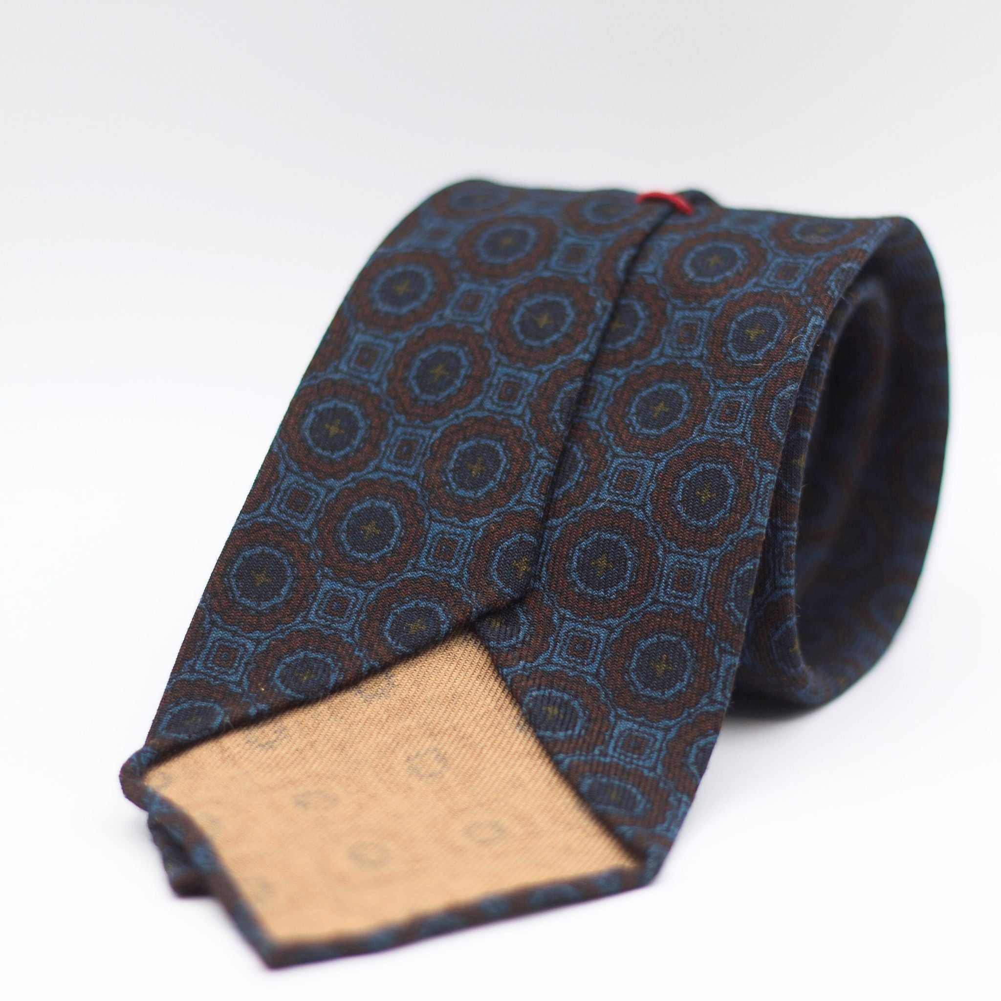 Cruciani & Bella 100%  Printed Wool  Unlined Hand rolled blades Brown, Blue and Green Motifs Tie Handmade in Italy 8 cm x 150 cm