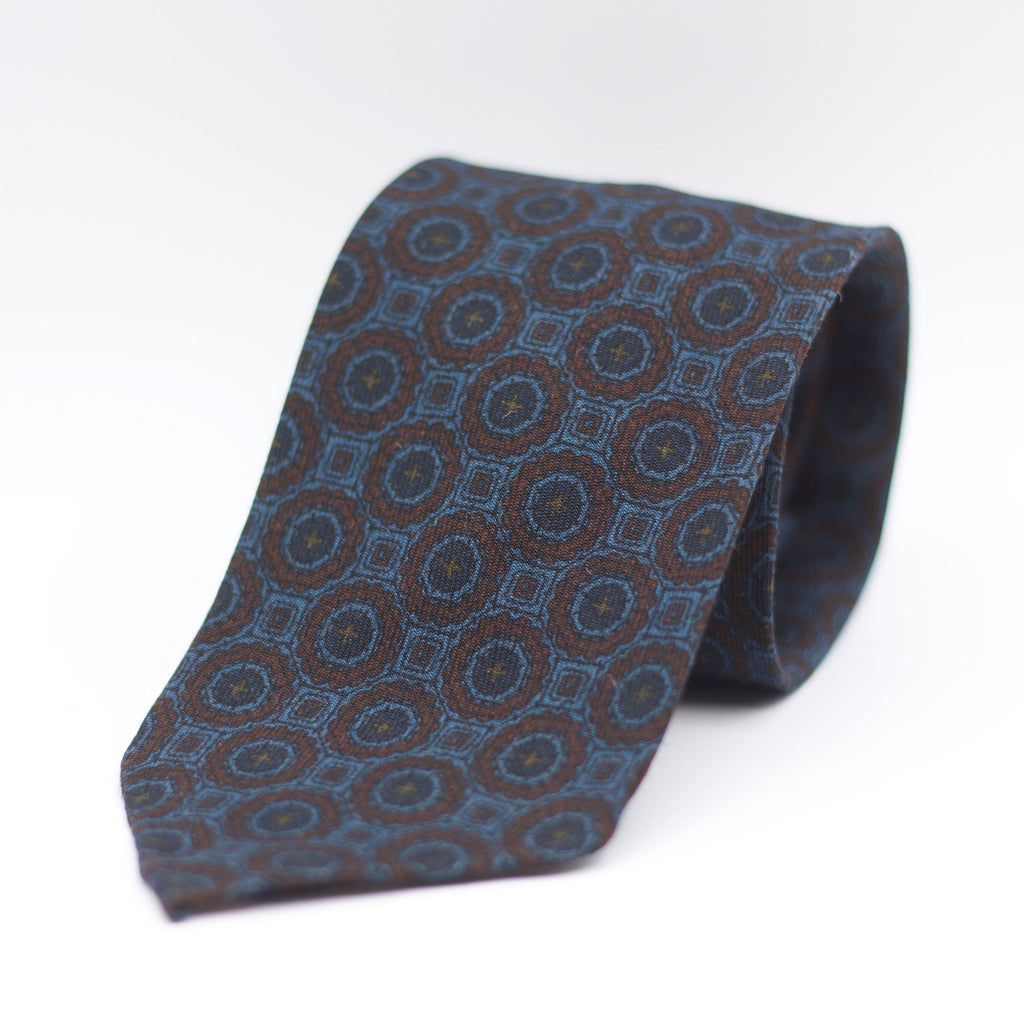 Cruciani & Bella 100%  Printed Wool  Unlined Hand rolled blades Brown, Blue and Green Motifs Tie Handmade in Italy 8 cm x 150 cm