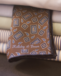 Holliday & Brown Hand-rolled   Holliday & Brown for Cruciani & Bella 100% Silk Brown, Blue and Light Blue Double Faces Patterned  Motif  Pocket Square Handmade in Italy 32 cm X 32 cm