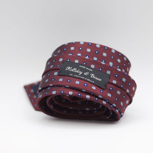 Holliday & Brown for Cruciani & Bella 100% Woven Jacquard Silk Tipped Burgundy, Blue, Light Blue and White  motif tie Handmade in Italy 8 cm x 150 cm