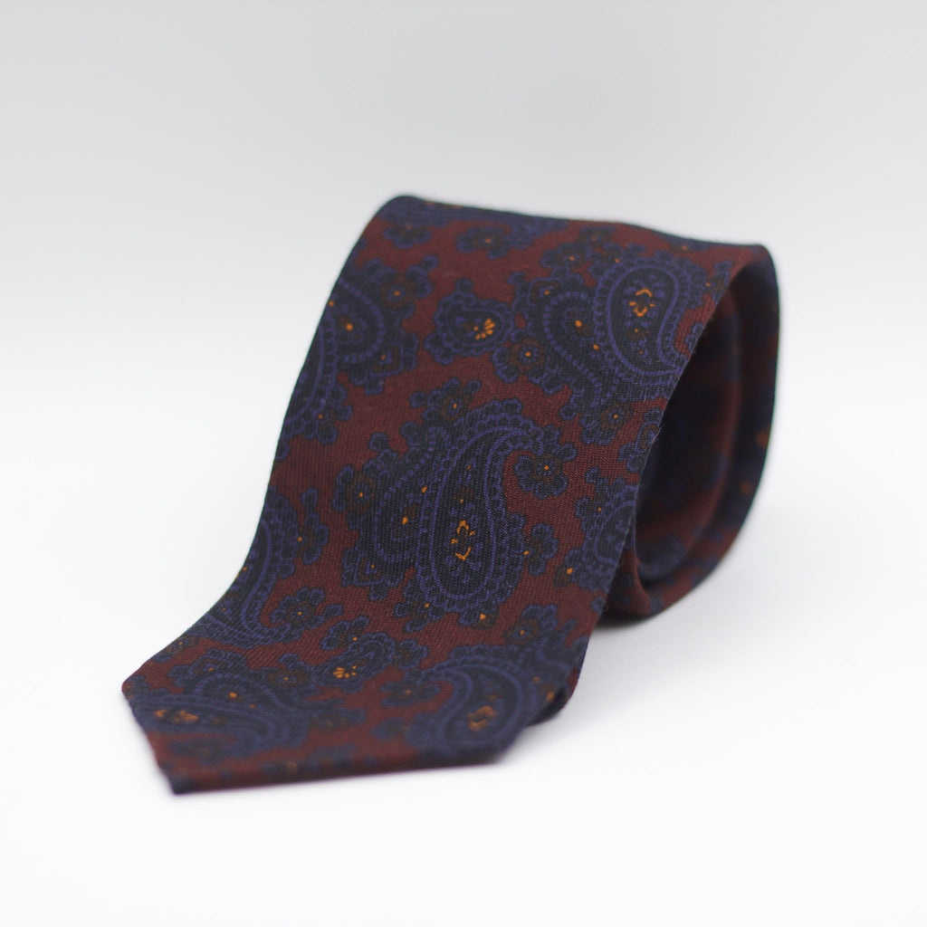 Cruciani & Bella 100%  Printed Wool  Unlined Hand rolled blades Burgundy, Blue, Orange and Green Paisley Motifs Tie Handmade in Italy 8 cm x 150 cm