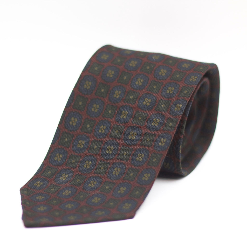 Cruciani & Bella 100%  Printed Wool  Unlined Hand rolled blades Burgundy, Blue and Green Motifs Tie Handmade in Italy 8 cm x 150 cm