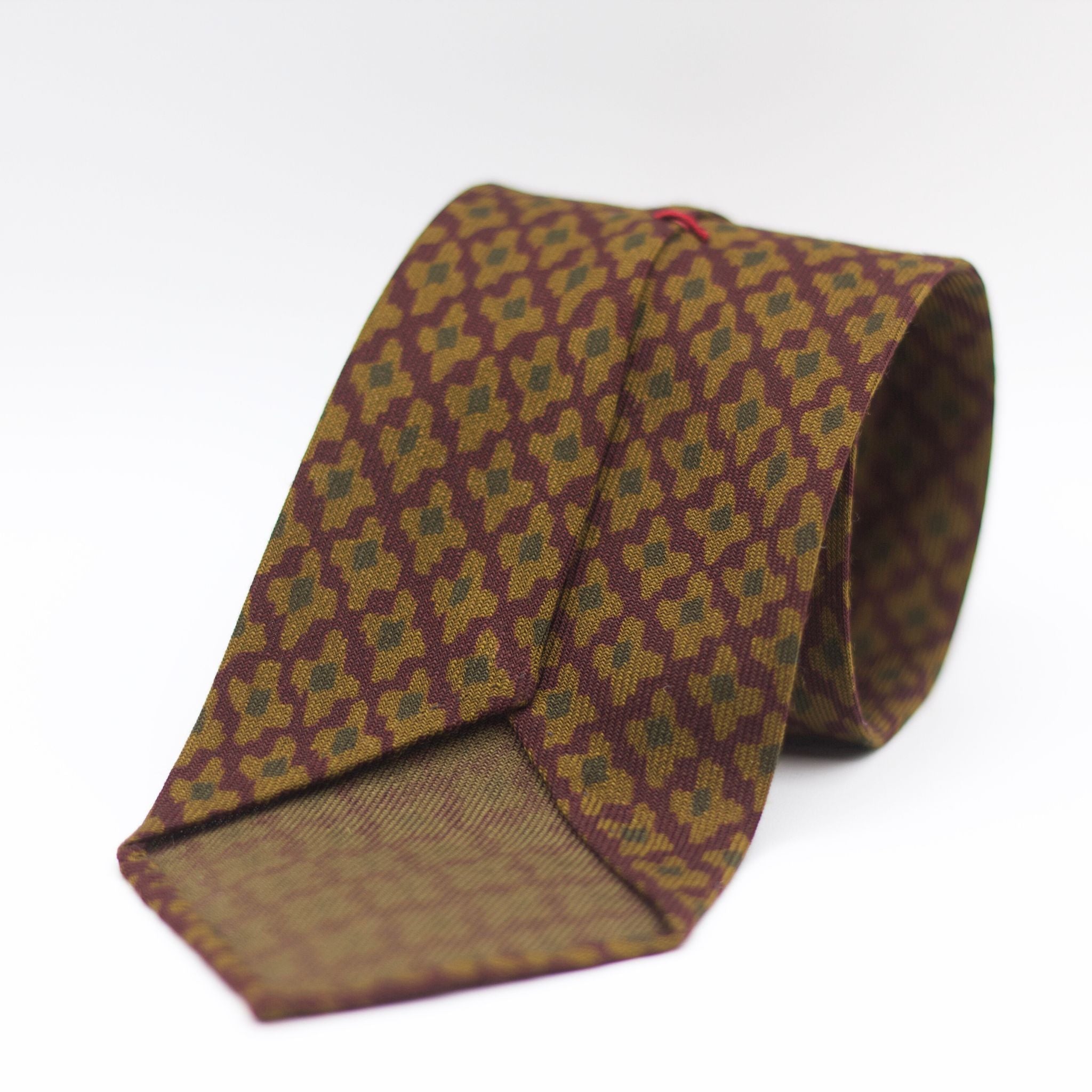 Cruciani & Bella 100%  Printed Wool  Unlined Hand rolled blades Burgundy, Mustard and Green Motifs Tie Handmade in Italy 8 cm x 150 cm