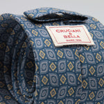 Cruciani &amp; Bella
100% Printed Silk

Self-Tipped
Blue, Grey and Yerllow Motif Tie&nbsp;
Handmade in Rome, Italy.

8 cm x 150 cm
#9295