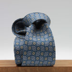 Cruciani &amp; Bella
100% Printed Silk

Self-Tipped
Blue, Grey and Yerllow Motif Tie&nbsp;
Handmade in Rome, Italy.

8 cm x 150 cm
#9295