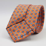 Cruciani &amp; Bella
100% Printed Silk

Self-Tipped
Orange, Blue, Light Blue and White Motif Tie&nbsp;
Handmade in Rome, Italy.

8 cm x 150 cm
#9298