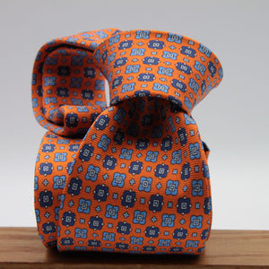 Cruciani &amp; Bella
100% Printed Silk

Self-Tipped
Orange, Blue, Light Blue and White Motif Tie&nbsp;
Handmade in Rome, Italy.

8 cm x 150 cm
#9298