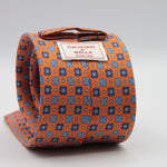 Cruciani &amp; Bella
100% Printed Silk

Self-Tipped
Orange, Blue, Light Blue and White Motif Tie&nbsp;
Handmade in Rome, Italy.

8 cm x 150 cm
#9298