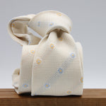 Cruciani &amp; Bella
100% Silk Garza Fina
Woven in Italy
Self-Tipped

Off-White, Yellow and Light Blue Tie
Handmade in Italy
8 cm x 150 cm
#9446