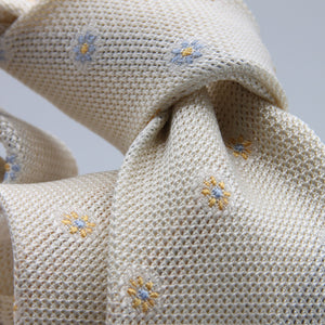 Cruciani &amp; Bella
100% Silk Garza Fina
Woven in Italy
Self-Tipped

Off-White, Yellow and Light Blue Tie
Handmade in Italy
8 cm x 150 cm
#9446