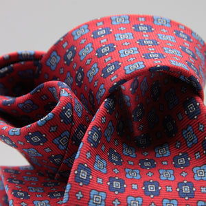 Cruciani &amp; Bella
100% Printed Silk

Self-Tipped
Red, Blue, Light Blue and White Motif Tie&nbsp;
Handmade in Rome, Italy.

8 cm x 150 cm
#9297