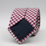 Cruciani &amp; Bella

100% Woven Jacquard silk
Tipped

Fuchsia Houndstooth Tie
Handmade in Como, Italy
8 cm x 150 cm
#7723