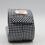 Cruciani &amp; Bella

100% Woven Jacquard Silk
Tipped
3-Folds High
White and dark Blue Optical Motif Tie
Handmade in Como, Italy
8 cm x 150 cm
#7877