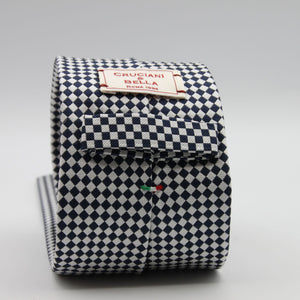 Cruciani &amp; Bella

100% Woven Jacquard Silk
Tipped
3-Folds High
White and dark Blue Optical Motif Tie
Handmade in Como, Italy
8 cm x 150 cm
#7877