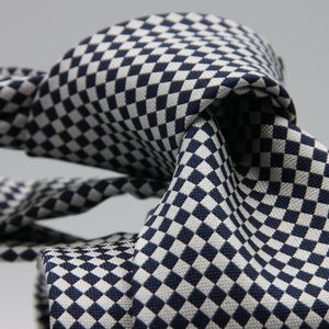 Cruciani &amp; Bella

100% Woven Jacquard Silk
Tipped
3-Folds High
White and dark Blue Optical Motif Tie
Handmade in Como, Italy
8 cm x 150 cm
#7877