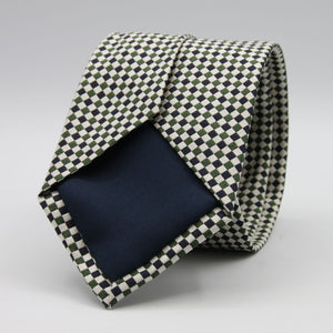 Cruciani &amp; Bella

100% Woven Jacquard silk
Tipped

Green, Off White and Blue Optical Motif Tie
Handmade in Como, Italy
8 cm x 150 cm
#8805